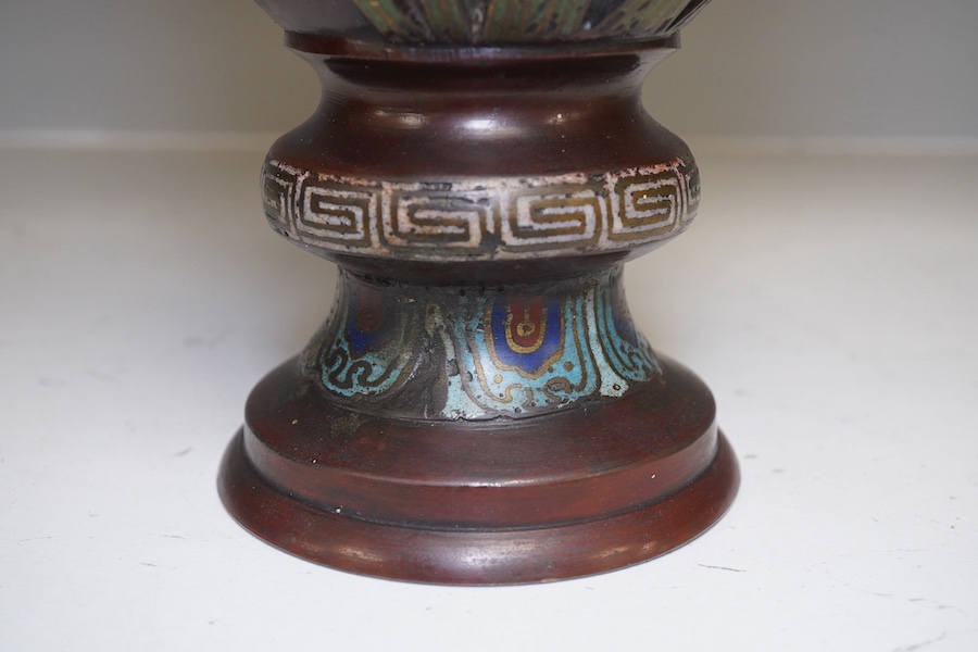 A Japanese bronze and champlevé enamel vase, decorated with irises, 30.5cm high. Condition - fair.